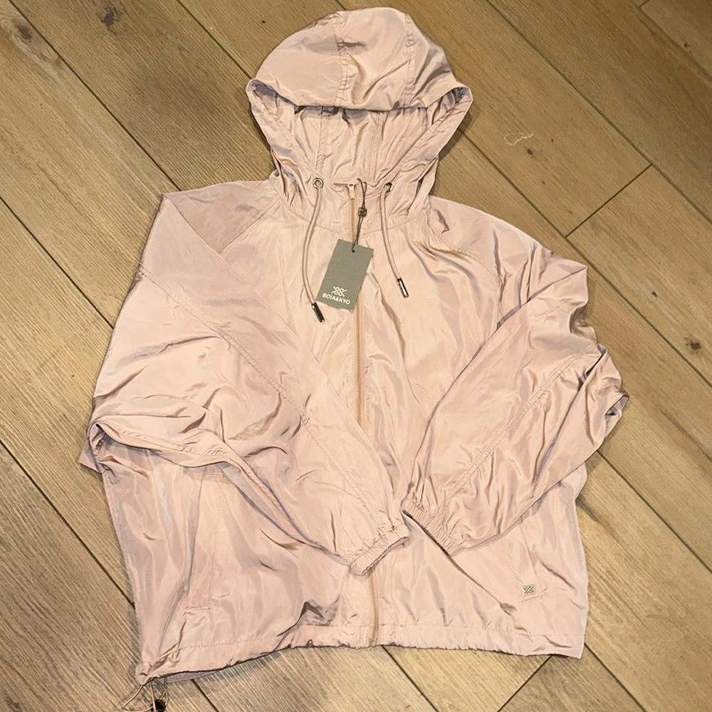 Brand new rain coat